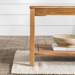 Ravenscroft Modern Boho Acacia Wood Slatted Outdoor Coffee Table With Lower Shelf - Saracina Home 21 Ravenscroft Modern Boho Acacia Wood Slatted Outdoor Coffee Table With Lower Shelf - Saracina Home -Saracina Home Shop GUEST 20e8c058 29f7 4dae 9c40 ba829a75f9e4