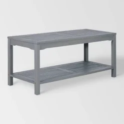 Ravenscroft Modern Boho Acacia Wood Slatted Outdoor Coffee Table With Lower Shelf - Saracina Home 27 Ravenscroft Modern Boho Acacia Wood Slatted Outdoor Coffee Table With Lower Shelf - Saracina Home -Saracina Home Shop GUEST b82362d2 34f0 4dc8 b530 c4b76868ed3f