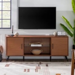 2 Door Mid-Century Modern Wood Storage TV Stand For TVs Up To 65" - Saracina Home 23 2 Door Mid-Century Modern Wood Storage TV Stand For TVs Up To 65" - Saracina Home -Saracina Home Shop GUEST e87ef0ee c10e 4106 930a 1a5aabd9a0c0